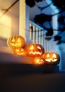 Halloween Front Porch Decorated with Pumpkin Lanterns