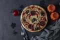 Halloween funny pizza with spiders, Creative idea for Halloween pizza on dark gray background, View from above