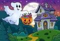 Halloween ghost near haunted house 1 Royalty Free Stock Photo