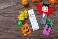 Halloween ghost and vampire toy gift stics puppets on wooden table. Handmade. Project of children`s creativity, handicrafts, Royalty Free Stock Photo