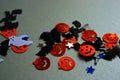 .Halloween glitter confetti mix. Ginger glossy pumpkins, black bats and witches. Blue and silver stars, white ghost