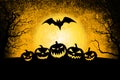 Halloween grunge banner background with flying bats and Jack o` lantern pumpkins Royalty Free Stock Photo