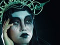 Halloween, grunge beauty face and fantasy cosmetics with dark royalty and ghost aesthetic. Cosplay, goth fashion and