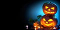 Halloween holiday background. Curved Halloween pumpkins