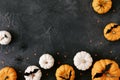 Halloween holiday background with party decorations of pumpkins and bats on white table top view. Happy halloween greeting card Royalty Free Stock Photo