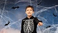 Boy in halloween costume of skeleton Royalty Free Stock Photo