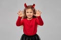 Girl costume with devil`s horns on halloween Royalty Free Stock Photo
