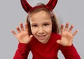 Girl costume with devil`s horns on halloween Royalty Free Stock Photo