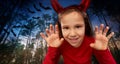 girl costume with devil's horns on halloween Royalty Free Stock Photo