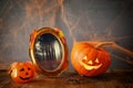 Halloween holiday concept. Cute pumpkin and old frame Royalty Free Stock Photo