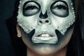 Beautiful girl model with black body with silver mask Royalty Free Stock Photo