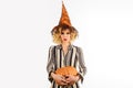 Halloween holidays. Woman in witch hat with pumpkin. 31 october. Beautiful woman in witches costume with Jack-o-lantern.