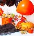 Halloween home decor with pumpkin, spider web, autumn leaves, balloons Royalty Free Stock Photo