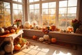 Halloween home decoration with pumpkins, autumn leaves and flowers.