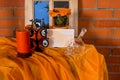 Halloween home decorations with spiders and pumpkin bucket for trick or treat. Greeting Card. Halloween pumpkin brick Royalty Free Stock Photo