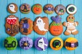 Halloween homemade gingerbread cookies and cupcakes background. Royalty Free Stock Photo