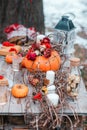 Halloween inspiration. Autumn still life. pumpkin, dry roses, viburnum honey cake. in a vase. twigs. on the table