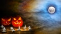 Halloween jack-o-lantern on the terrifying midnight sky with full moon background Royalty Free Stock Photo