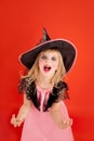 Halloween kid girl costume on orange