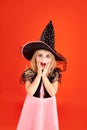 Halloween kid girl costume on orange