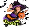 Halloween kids, Happy scary girl dressed up in halloween costumes of witch, sorcerer and vampire Dracula for pumpkin patch Royalty Free Stock Photo