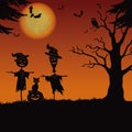 Halloween landscape, scarecrows and pumpkin