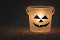 Halloween lantern by bucket in the dark Royalty Free Stock Photo