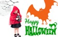 Halloween. Little Red Riding Hood. Beautiful little girl in a red raincoat. Royalty Free Stock Photo