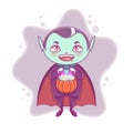 Halloween little vampire Dracula. Boy kid with smiling face in halloween costume with pumpkin in his hands.