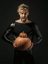 Halloween macho with angry face in black costume