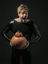 Halloween macho excited with open mouth in black costume