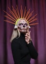 Halloween Make-Up Style, Fancy Dress and Diadem. Blond Model Wear Sugar Skull Makeup with Crown. Santa Muerte concept Royalty Free Stock Photo