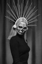 Halloween Make-Up Style, Fancy Dress and Diadem. Blond Model Wear Sugar Skull Makeup with Crown. Santa Muerte concept