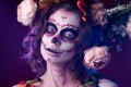 Halloween make up sugar skull beautiful model. Santa Muerte concept. Royalty Free Stock Photo