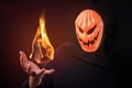 Halloween man with pumpkin mask control fireball