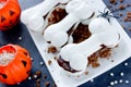 Halloween meringue bones with chocolate, sweet treats for kids