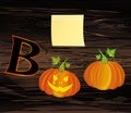 Halloween message Boo from pumpkins. Vector on wooden background