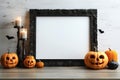 Halloween mockup, shelf with empty frame and holiday decorations. Black frame with pumpkin decor and candles, copy space. AI