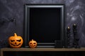 Halloween mockup, shelf with empty frame and holiday decorations. Black frame with pumpkin decor and candles, copy space. AI