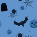 Halloween monsters on blue background.  Seamless pattern with black silhouettes of bat, pumpkins, spider, cobweb, gravestones. Royalty Free Stock Photo