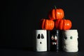 Halloween monsters with pumpkins