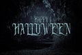 Halloween mysterious background of dark and haunted forest with text.