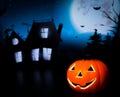 Halloween night background with scary house and bat and pumpkin