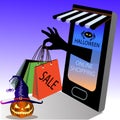 Halloween Online shopping concept. Shopping cart with bags standing upon big mobile phone and pumpkins with purple witches hat