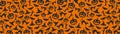 Halloween orange festive seamless pattern. Endless background with pumpkins, skulls, bats, spiders, ghosts, bones Royalty Free Stock Photo