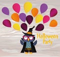 Halloween. The owl in the suit throws a lot of traditional balloons into the air. Greeting card or invitation for a holiday. A bl Royalty Free Stock Photo