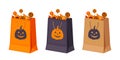 Halloween paper bags with candies. Vector illustration. Royalty Free Stock Photo