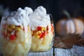 Halloween parfait made from layers of chopped pineapples, candy corn, and whipped cream Royalty Free Stock Photo
