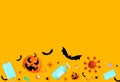 Halloween party background with pumpkin, medical mask, full of candies, sweets,alcohol gel,mask on yellow background Halloween