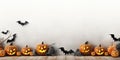 Halloween Party Banner - Pumpkins, Bats Wings, and Candles on White Plank Wood